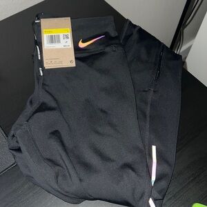 Nike Women's Dri Fit Mid Rise 7/8 
Nike running pants - Leggings